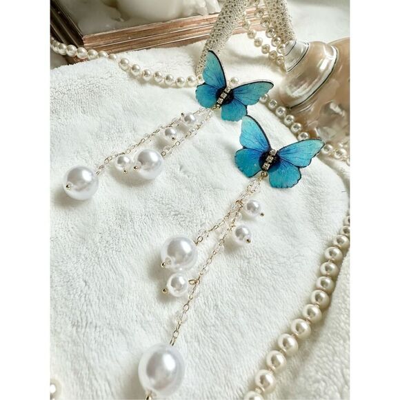 Bright blue butterfly earrings with faux pearl dangle ￼ - Picture 5 of 5
